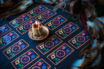 Tarot cards, Concept of fortune telling and predictions, magical rituals and wicca elements on a table