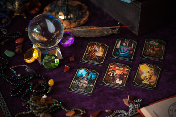 Tarot cards, Concept of fortune telling and predictions, magical rituals and wicca elements on a table