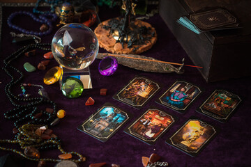 Tarot cards, Concept of fortune telling and predictions, magical rituals and wicca elements on a table