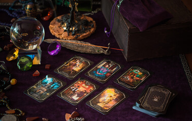 Tarot cards, Concept of fortune telling and predictions, magical rituals and wicca elements on a table