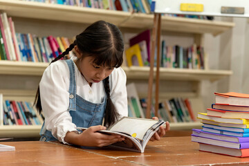 Education image,asian children happy learning in library at school.