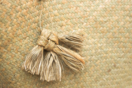 Fish key chain made from ratten is on rattern background