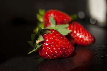 strawberries on wooden background