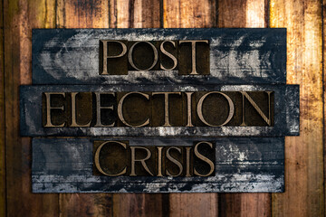 Post Election Crisis text formed with real authentic typeset letters on vintage textured silver grunge copper and gold background