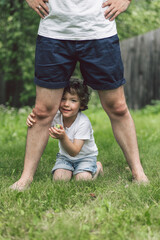 Father and his son playing and hugging in outdoors. Concept of Father's day. 