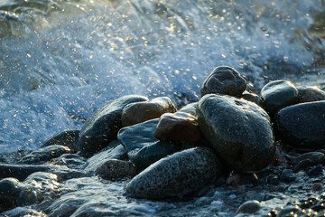 Natural background with large stones and waves