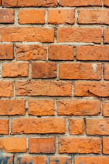 brick red wall texture. background of a old brick house.