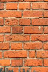 brick red wall texture. background of a old brick house.