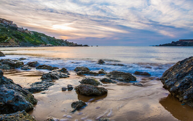 Ghajn Tuffieha; one of Malta's most well-known panoramic locations, seen from the rocky shore