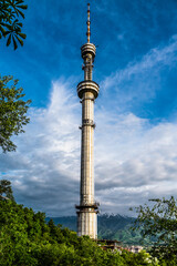 Naklejka premium Sunset over the city of Almaty and a view of the Kok Tobe TV tower