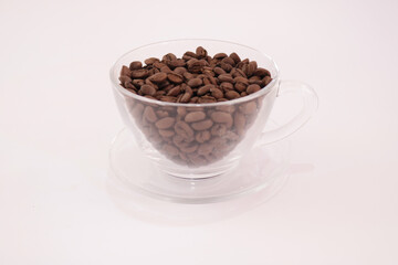 coffee beans in transparent cup