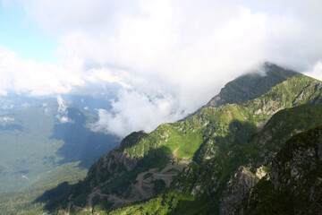 mountain top landscape. mountains in the clouds
