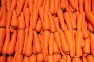 Beautiful ripe carrot background. Carrots in the supermarket. Thailand is known as a country with a...