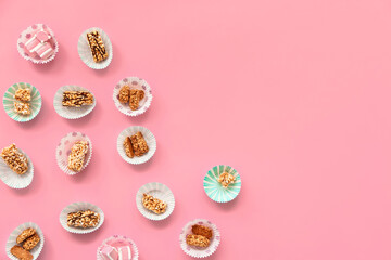 Crispy rice bars with marshmallow on color background