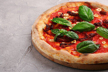 marinara pizza closeup on light concrete or stone background