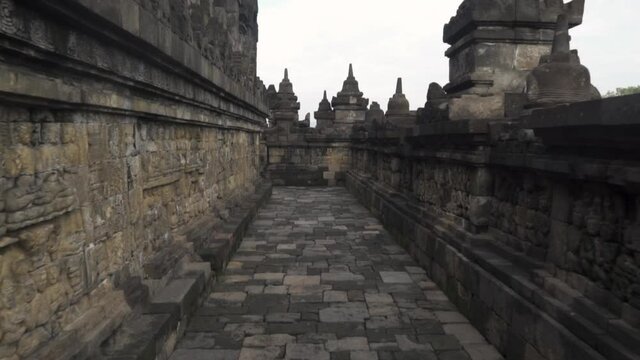 Candi Borobudur - Mahayana Javanese Buddhist Temple UNESCO World Heritage Site - Beautiful Buddha Reliefs in Yogyakarta Magelang, Central Java, Indonesia Indonesians
