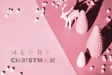 Trendy isometric Christmas arrangement with ceramic deer and Xmas trees in shades of pink, text Merry Christmas.