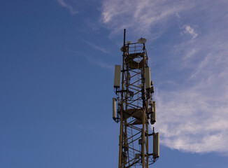 Fototapeta na wymiar Telecommunication tower of a mobile telecom operator.