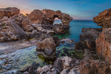 Fototapeta na wymiar Ta' Qassisu Natural rock formation at sunset