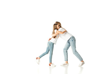 happy daughter hugging mother isolated on white