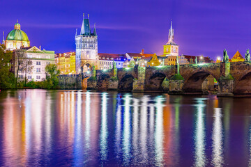 Obraz premium Panorama Charles Bridge, Prague Czech Republic. Great night view. Soft focus on the water.
