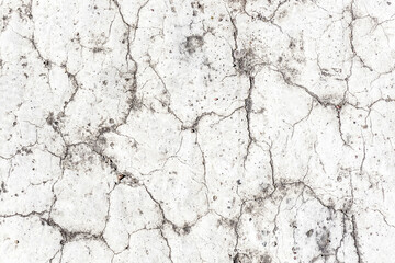 White paint asphalt cracks texture. Scratched lines background. White and black distressed grunge concrete wall pattern for graphic design.