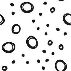 Hand drawn circles seamless pattern. Random dots loop texture background.