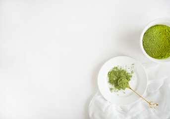 Green Tea Powder Flatlay on White Background. Matcha Powder with Copy Space