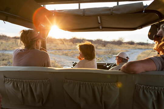 Fototapeta family in safari vehicle, Kalahari Desert, Makgadikgadi Salt Pans, Botswana