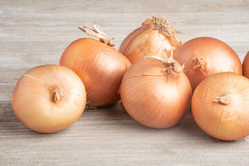 Sweet Southern-Grown Onions On A White Panel Board