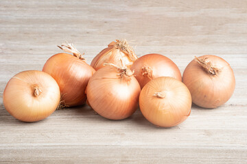 Sweet Southern-Grown Onions On A White Panel Board