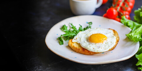 fried egg and toast bread salad delicious breakfast snack yolk and protein food background top view copy space eating healthy raw Takeaway