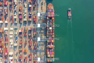 Container , container ship in export and import business and logistics. Shipping cargo to harbor by crane. Water transport International. Aerial view and top view.