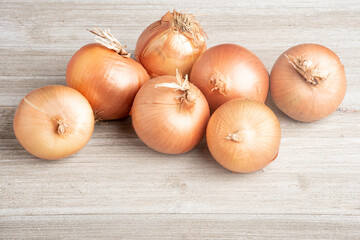 Sweet Southern-Grown Onions On A White Panel Board