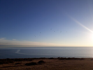 Obraz premium Nature of England. Blue skies and grass and cliff.