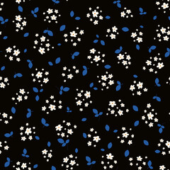 Vector seamless pattern with small scattered white flowers and blue leaves on black. Elegant floral background. Simple ditsy texture. Liberty style wallpapers. Repeat design for print, decor, fabric
