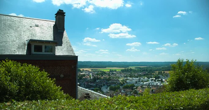 Rural village in France, countryside on warm spring day with picture perfect sky