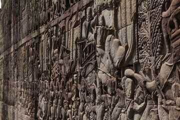 The temple complex of Angkor Watt, Cambodia wall relief depicting ancient wars