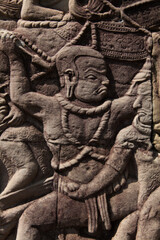 The temple complex of Angkor Watt, Cambodia wall relief depicting ancient wars