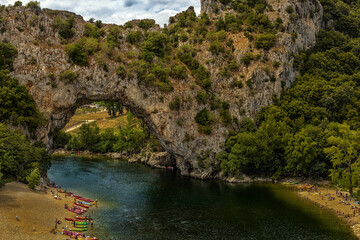 Pont d'Arc, France - Jul 15th 2020: a natural rock bridge considered as the entrance to the Ardèche Canyon