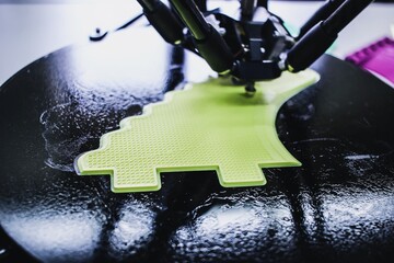 3D printing technology delta printer printing in progress a surfboard fin, joining sport and...
