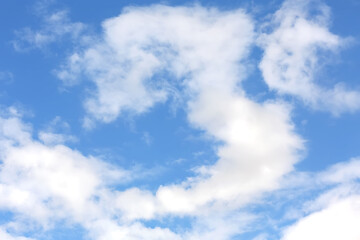 white clouds in the blue sky