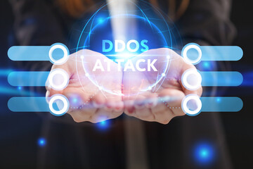Business, Technology, Internet and network concept. Young businessman working on a virtual screen of the future and sees the inscription: Ddos attack