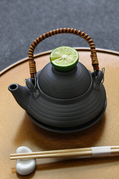 dobin mushi (Japanese cuisine) : steamed matsutake mushroom and pike conger with Japanese broth in an earthenware teapot and served.

