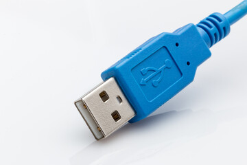 Blue USB cable on a white background. - 366564636