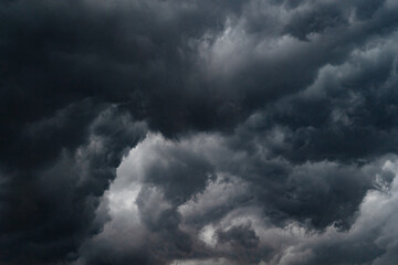 Fototapeta na wymiar Dark skies storm clouds