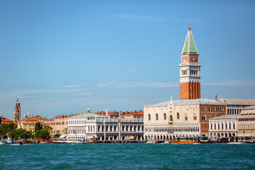 Fototapeta na wymiar Saint Mark's Square and Bell Tower Views on the Venice Skyline from a boat on the Canal 05