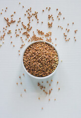 brown roasted buckwheat grains on the table
