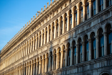 Fototapeta na wymiar Breathtaking Architecture of Column Arches Line the Interior of Saint Mark's Square in Famous Venice Italy 02