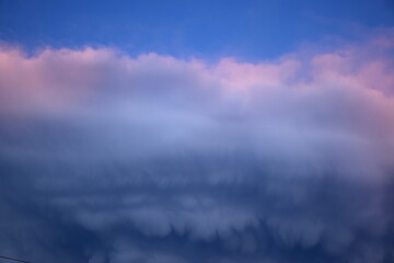 Naklejka na ściany i meble stormy clouds casting in the sky